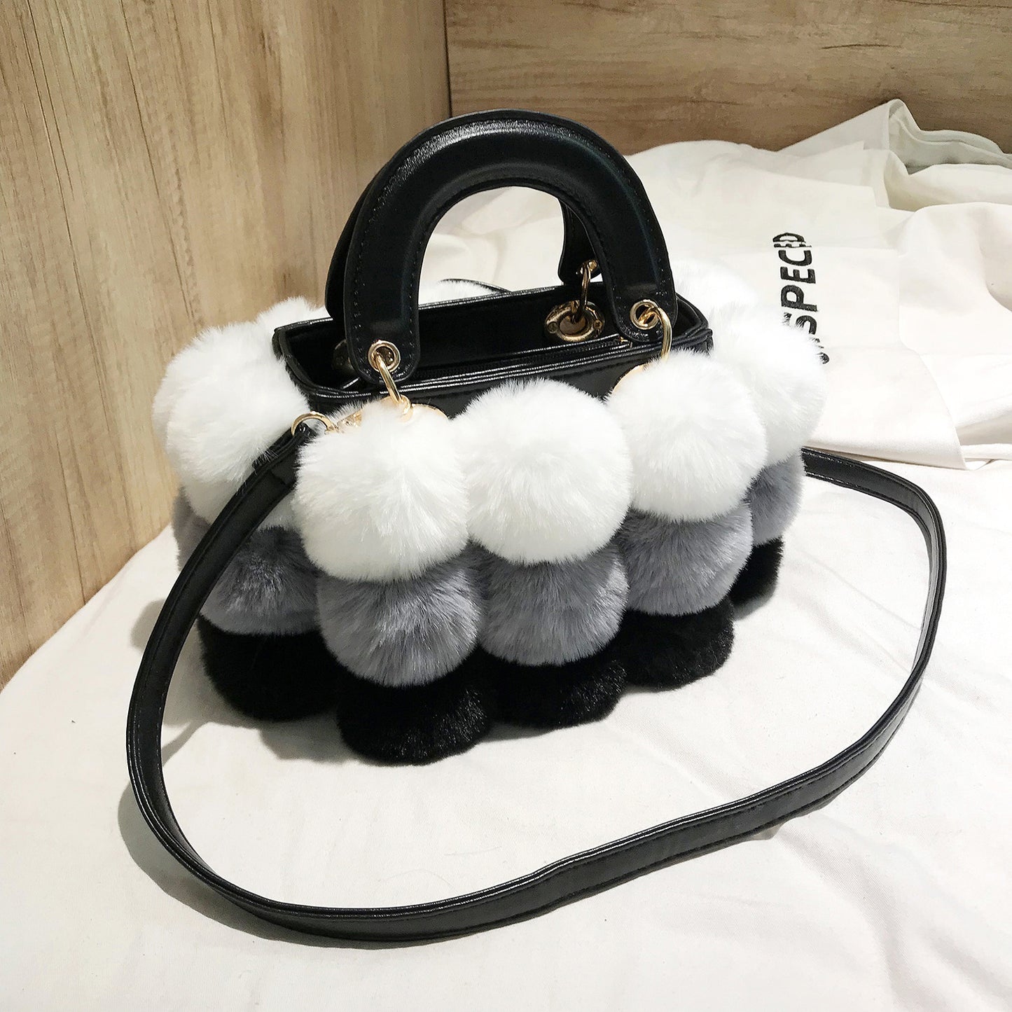 PLÜSCH-HANDTASCHE