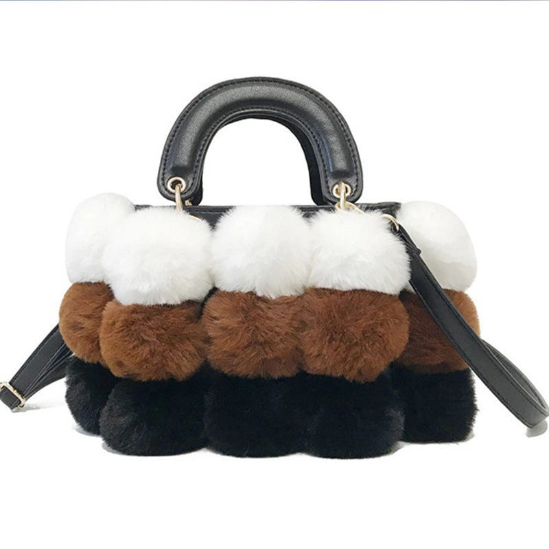 PLÜSCH-HANDTASCHE