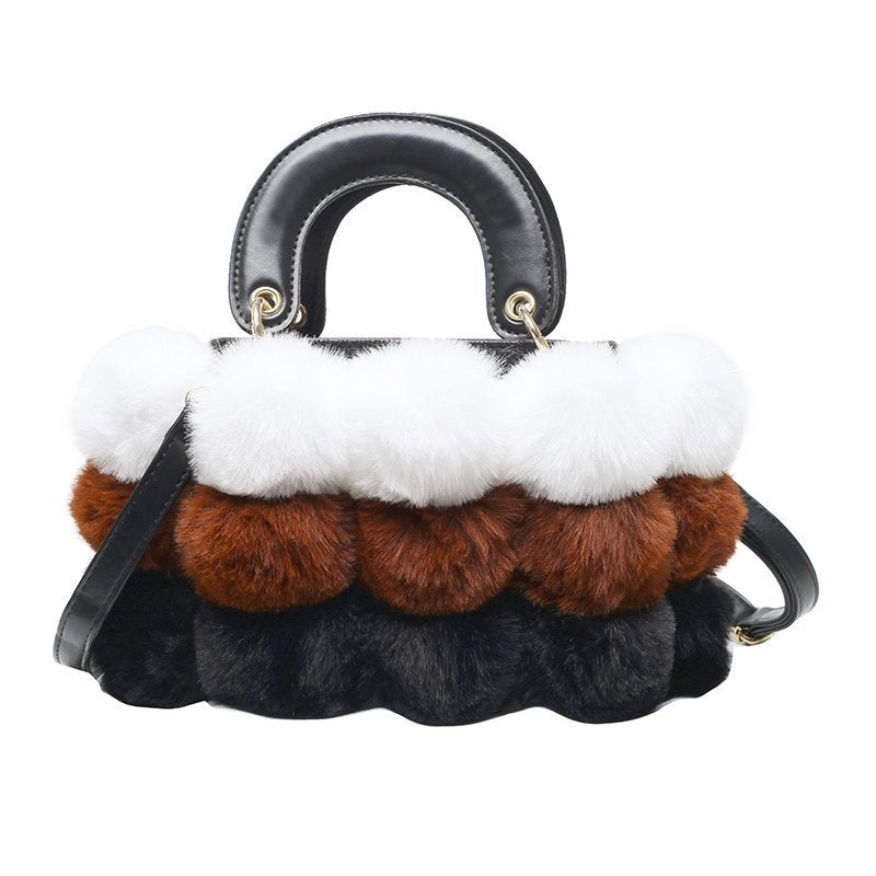 PLÜSCH-HANDTASCHE
